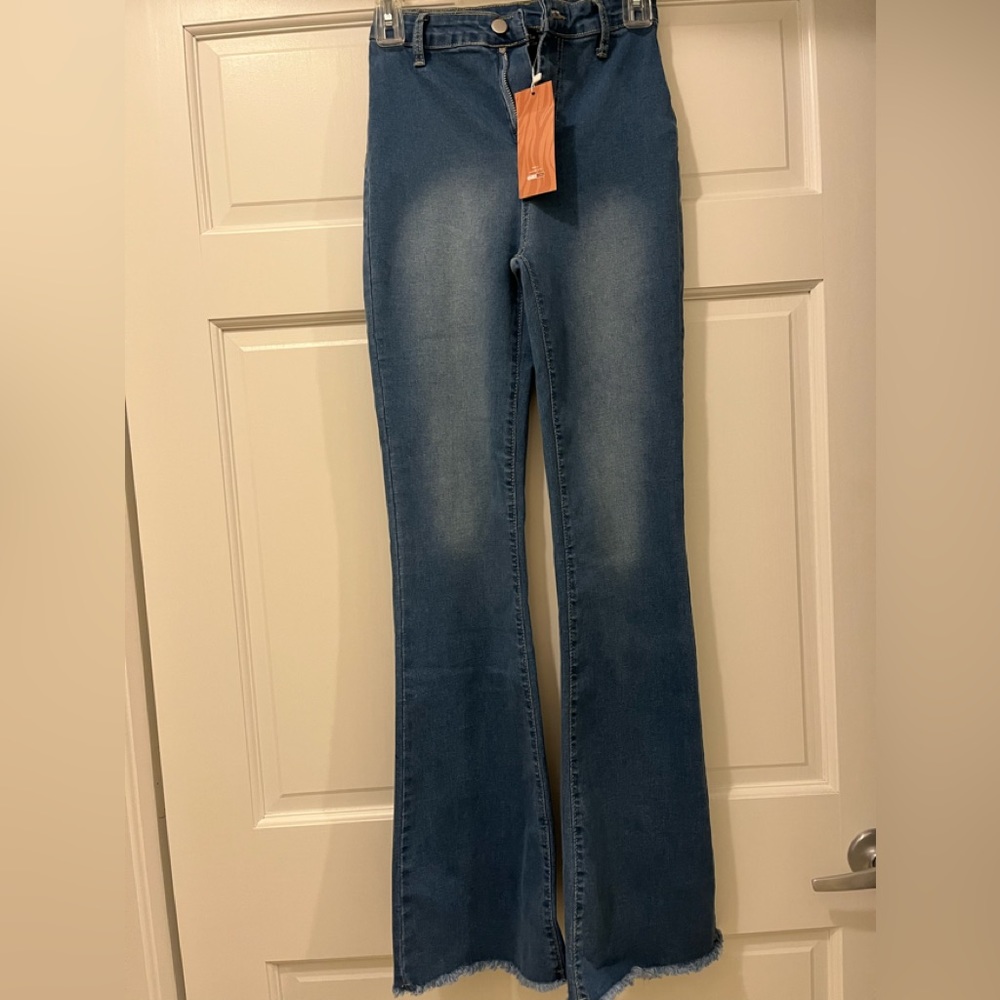 - - SHEIN women's light blue jeans, size 27. New with labels
